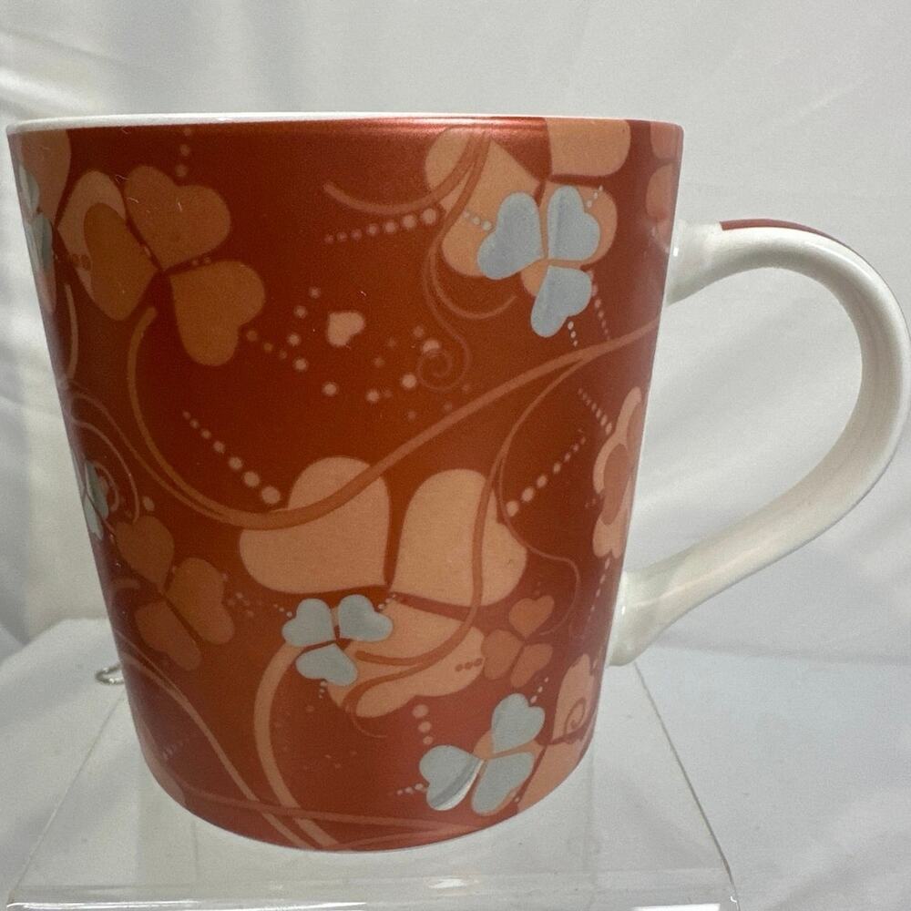 Vintage orange ceramic floral & hearts mug by eco one with silver one intl.